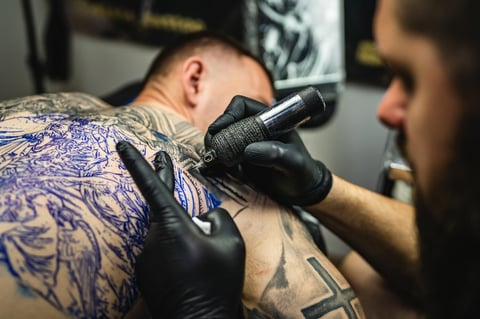 Tattoo artist at work
